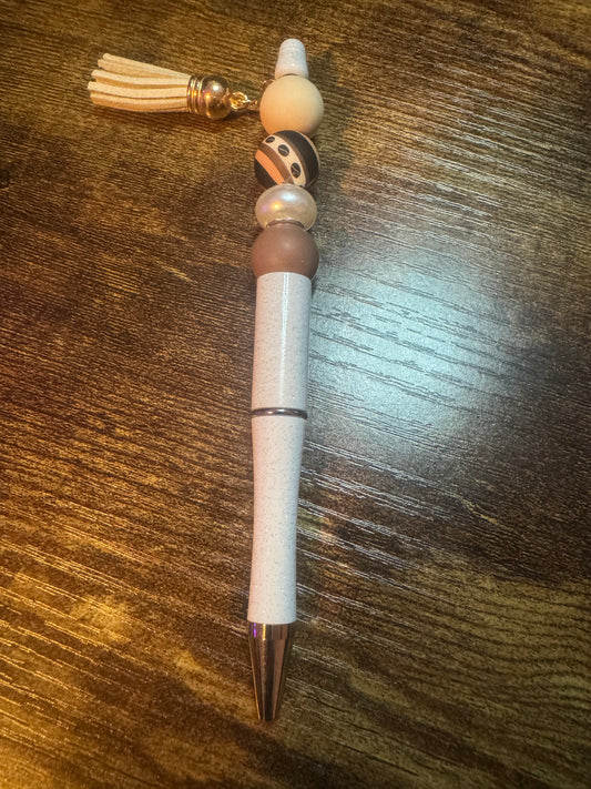 Pen white with brown and tassels